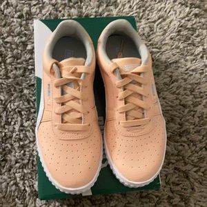 Peach Puma sneakers